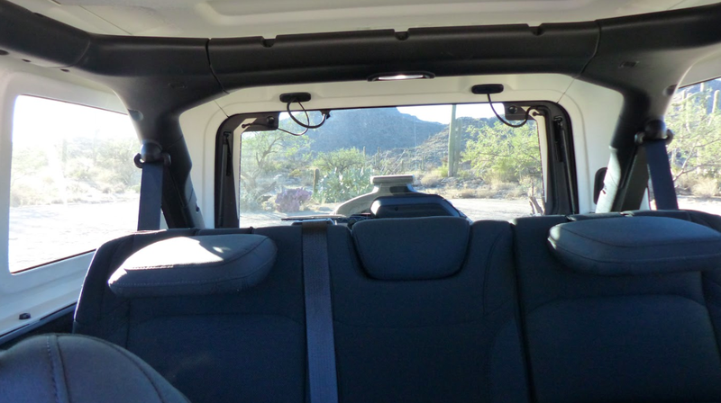 The stock tire on the new JL Wrangler doesn’t hurt visibility that badly. On its JK predecessor, visibility was a bigger issue.